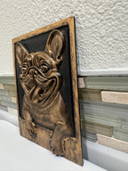 Left angle of the French Bulldog plaque leaning on a backsplash