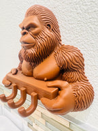 Left angle of the Sasquatch key holder showing hooks and fur detail