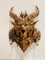 Close front view of the horned dragon's snarling face and hooks