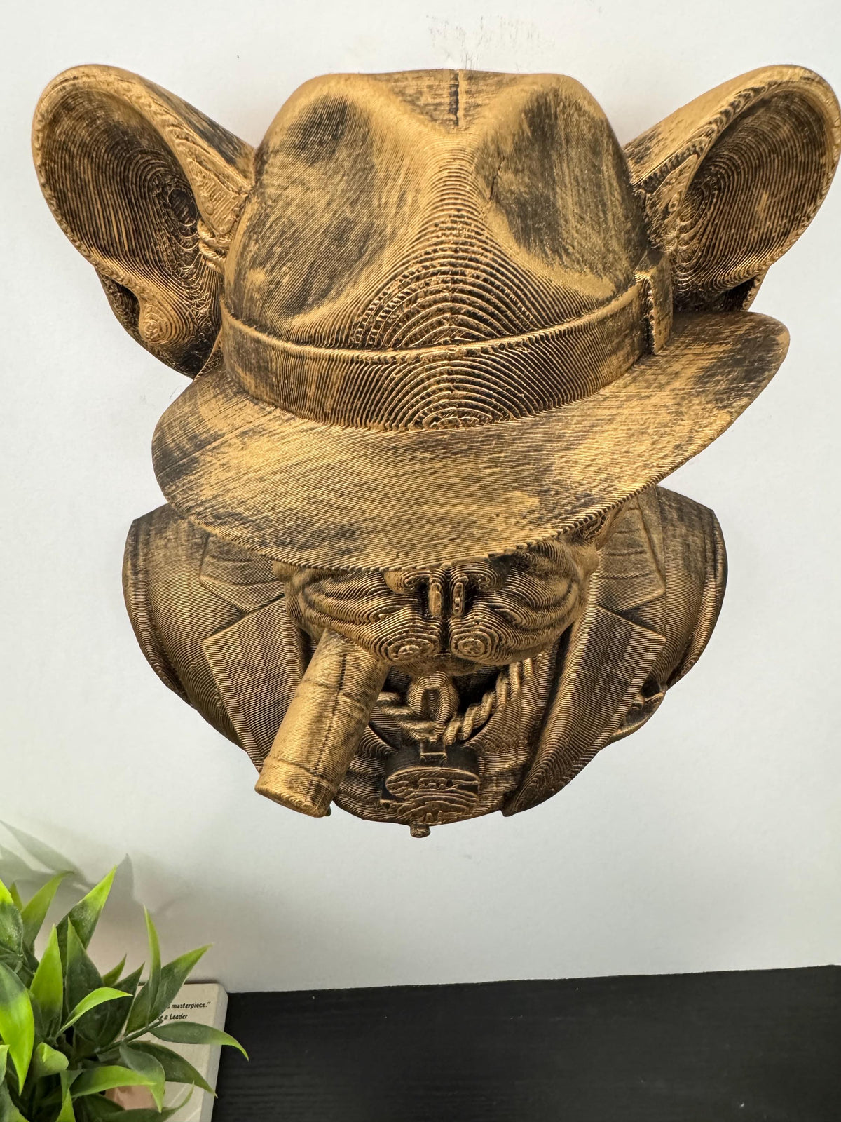 Top-down view of the French Bulldog's fedora and cigar