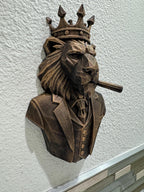 Left angle of the bronze lion boss showing cigar and mane facets