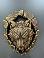 Top-down view of the wolf head showing ears and stone ring