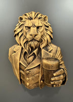 Front view of antique gold lion gentleman bust in a suit holding a beer glass
