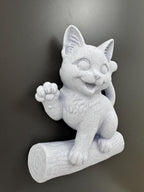 Left angle of the white stone-look kitten waving from its log