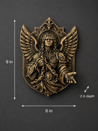 Dimension photo of the Saint Michael sculpture: 9 in. tall, 6 in. wide, 2 in. deep