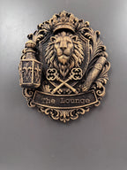 Low angle of The Lounge plaque showing banner lettering