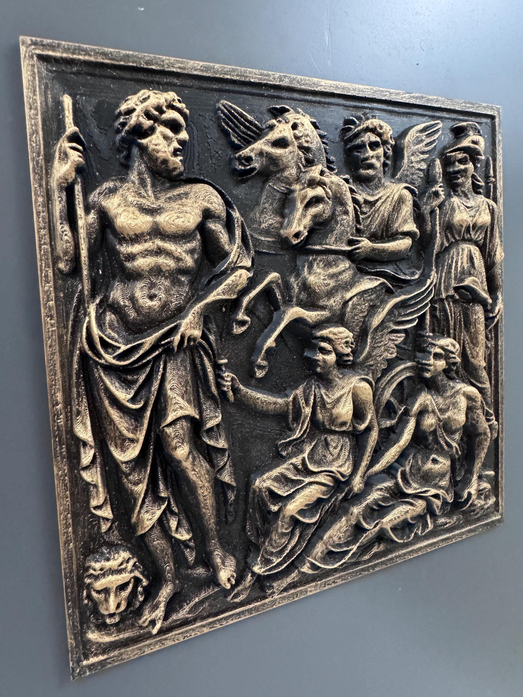 Left angle of the Greek gods panel showing Zeus and the Gorgon head