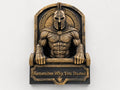 Front view of antique gold Spartan gym sculpture gripping a barbell above Remember Why You Started