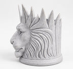 Left side view of the lion toothbrush holder showing mane relief
