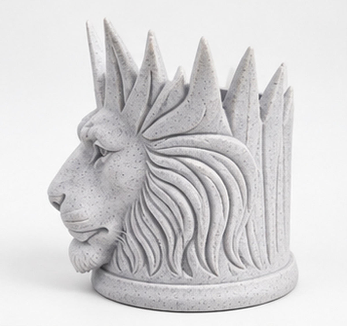 Left side view of the lion toothbrush holder showing mane relief