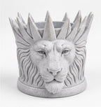 Slight angle of the lion holder showing crown points
