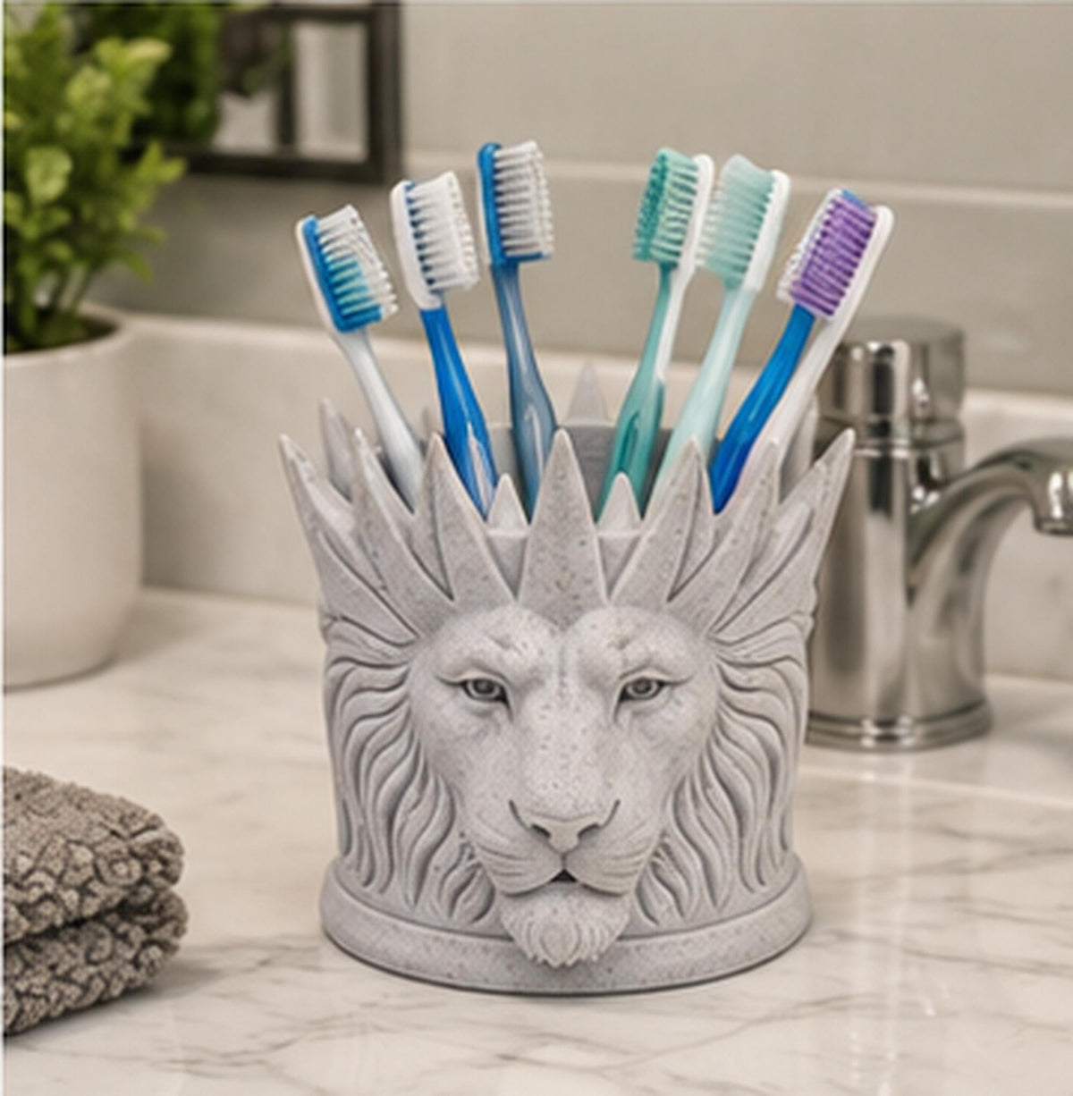 Speckled white crowned lion toothbrush holder on a bathroom counter with six toothbrushes
