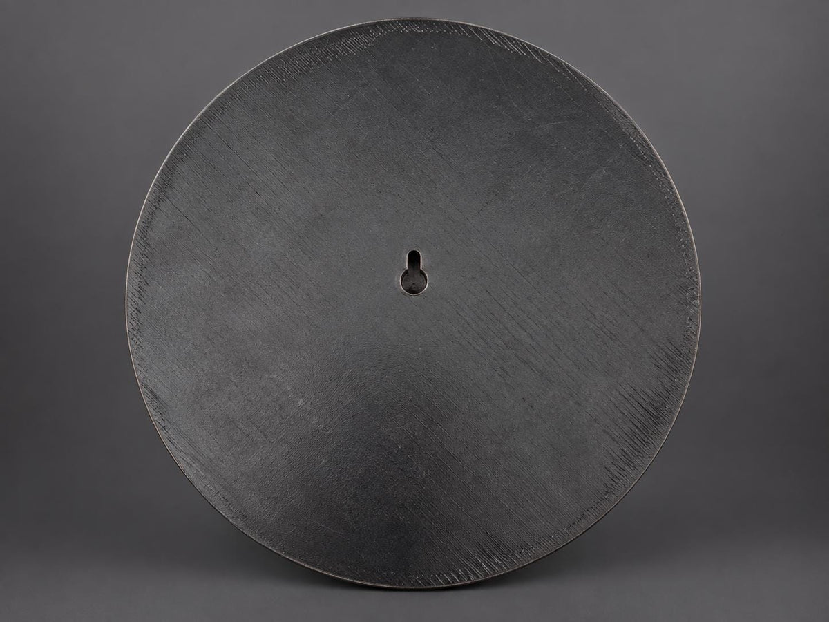 Back of the zodiac wheel showing the keyhole slot