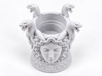 Top-down view into the open Medusa toothbrush cup