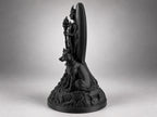Side view of the Hecate statue showing the crescent portal and seated hound
