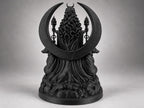 Back view of the Hecate statue showing the crescent portal and flowing hair