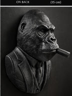 Left angle of the black gorilla bust showing the cigar and suit