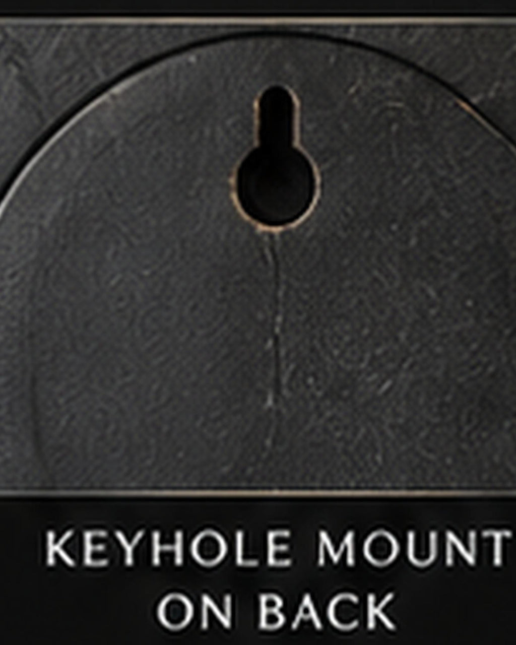 Close-up of the keyhole mount on the back of the plaque