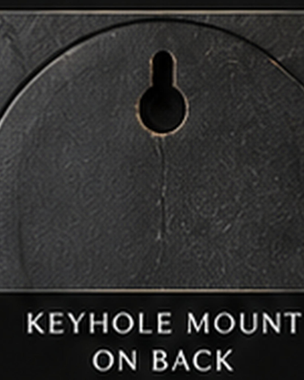 Close-up of the keyhole mount on the back of the plaque