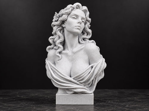 Front view of speckled white Aphrodite bust statue with wavy hair on a square base