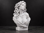Angled view of the Aphrodite bust showing flowing hair and flower