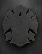 Back of the firefighter plaque showing the keyhole slot