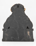 Back of the bulldog sculpture showing the keyhole mount