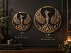 Size comparison of the 9 in. and 12 in. phoenix sculptures on a dark wall