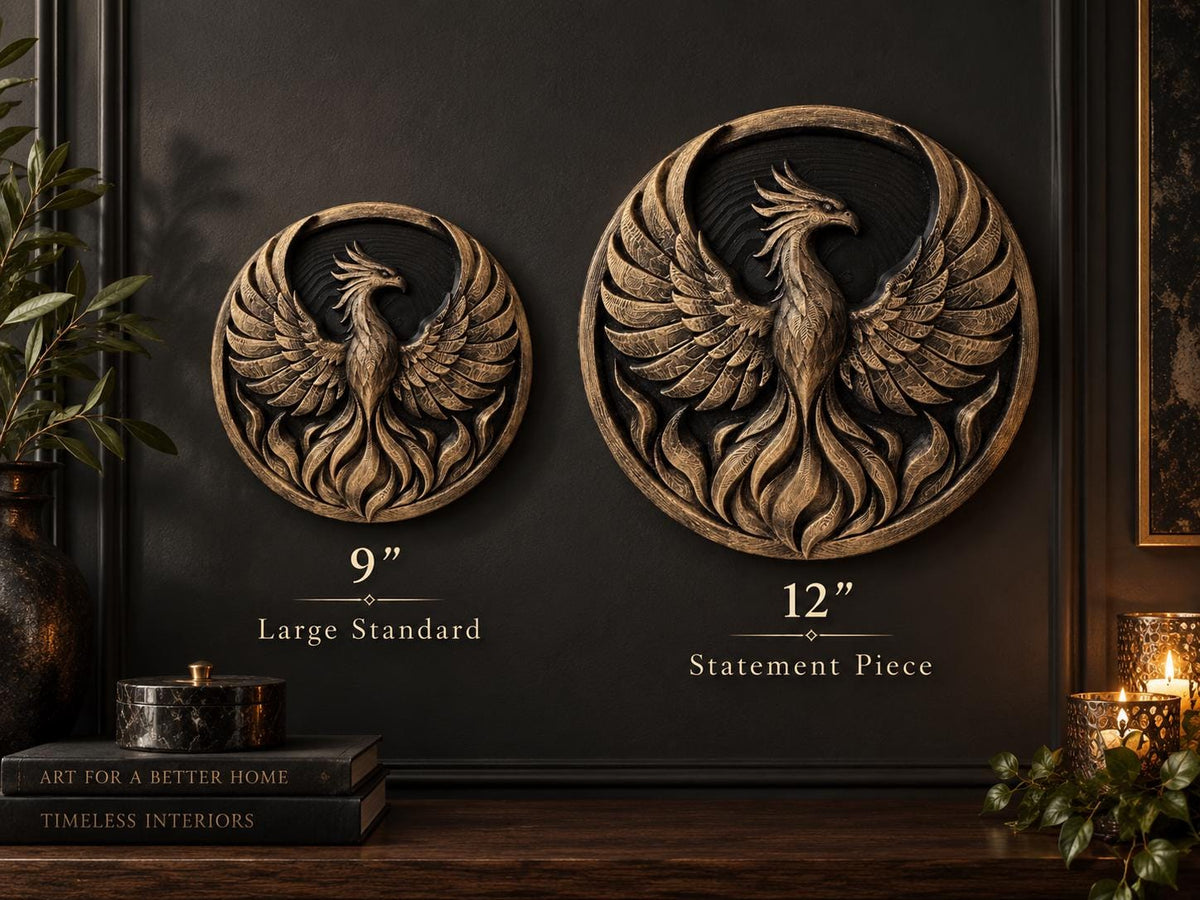 Size comparison of the 9 in. and 12 in. phoenix sculptures on a dark wall