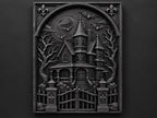 Front view of the black finish haunted house sculpture