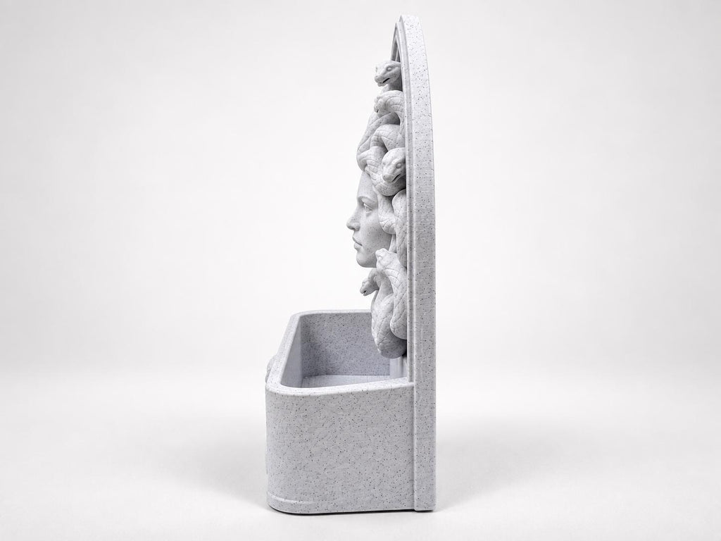 Side view of the Medusa organizer showing tray depth and face profile