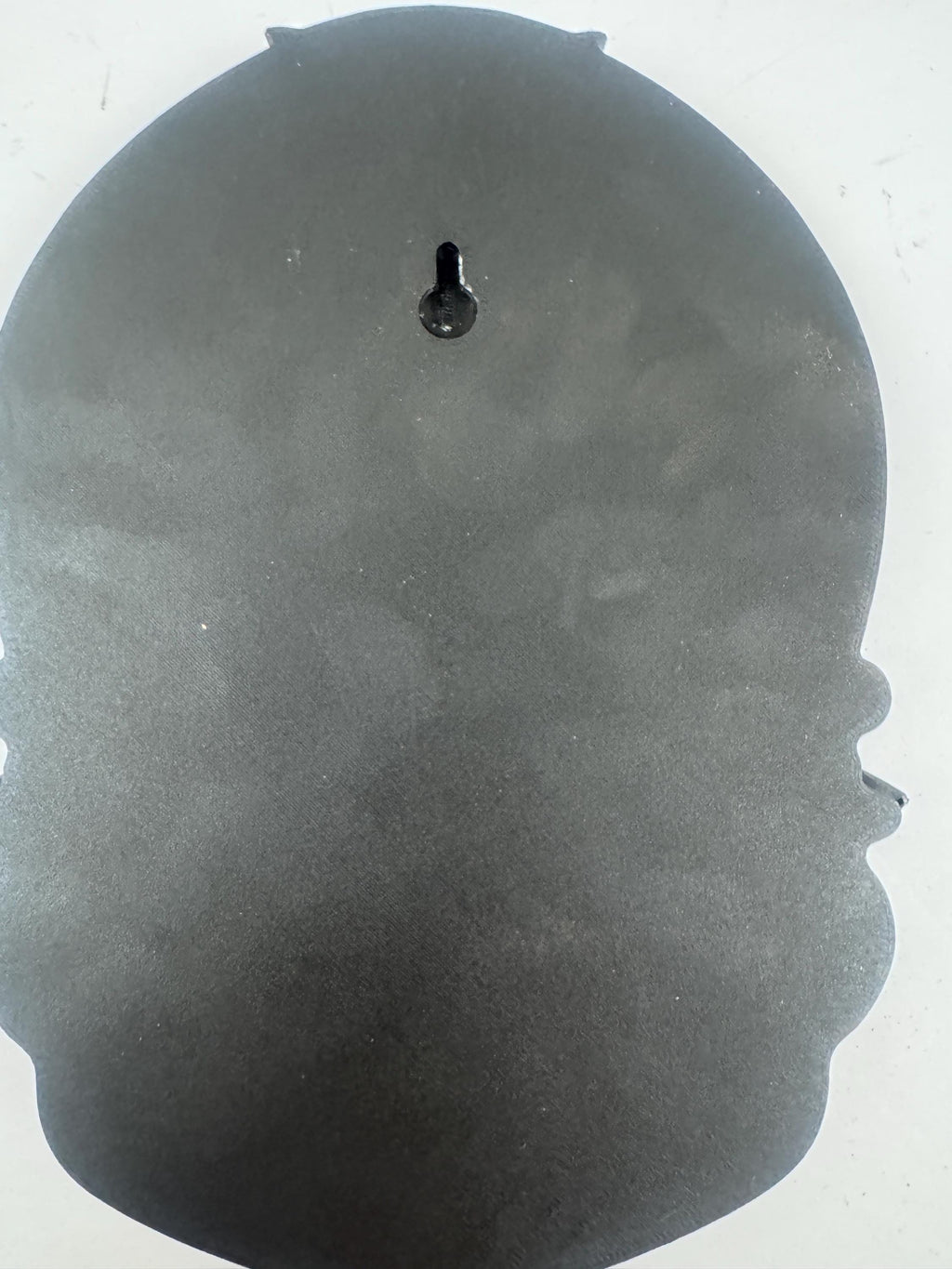 Back of the Hecate plaque showing the keyhole mount