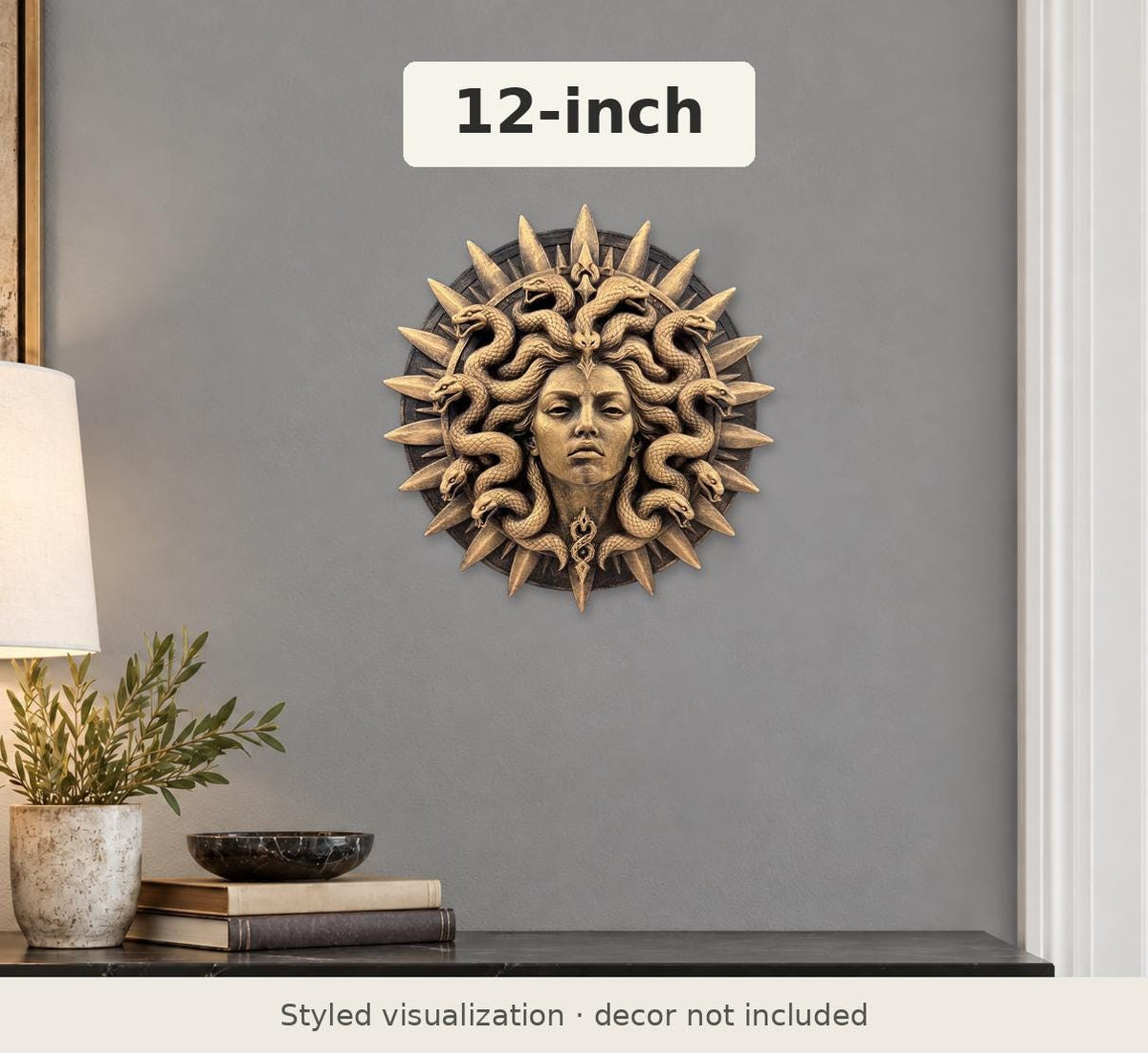 Styled view of the 12 in. Medusa medallion on a gray wall above a console