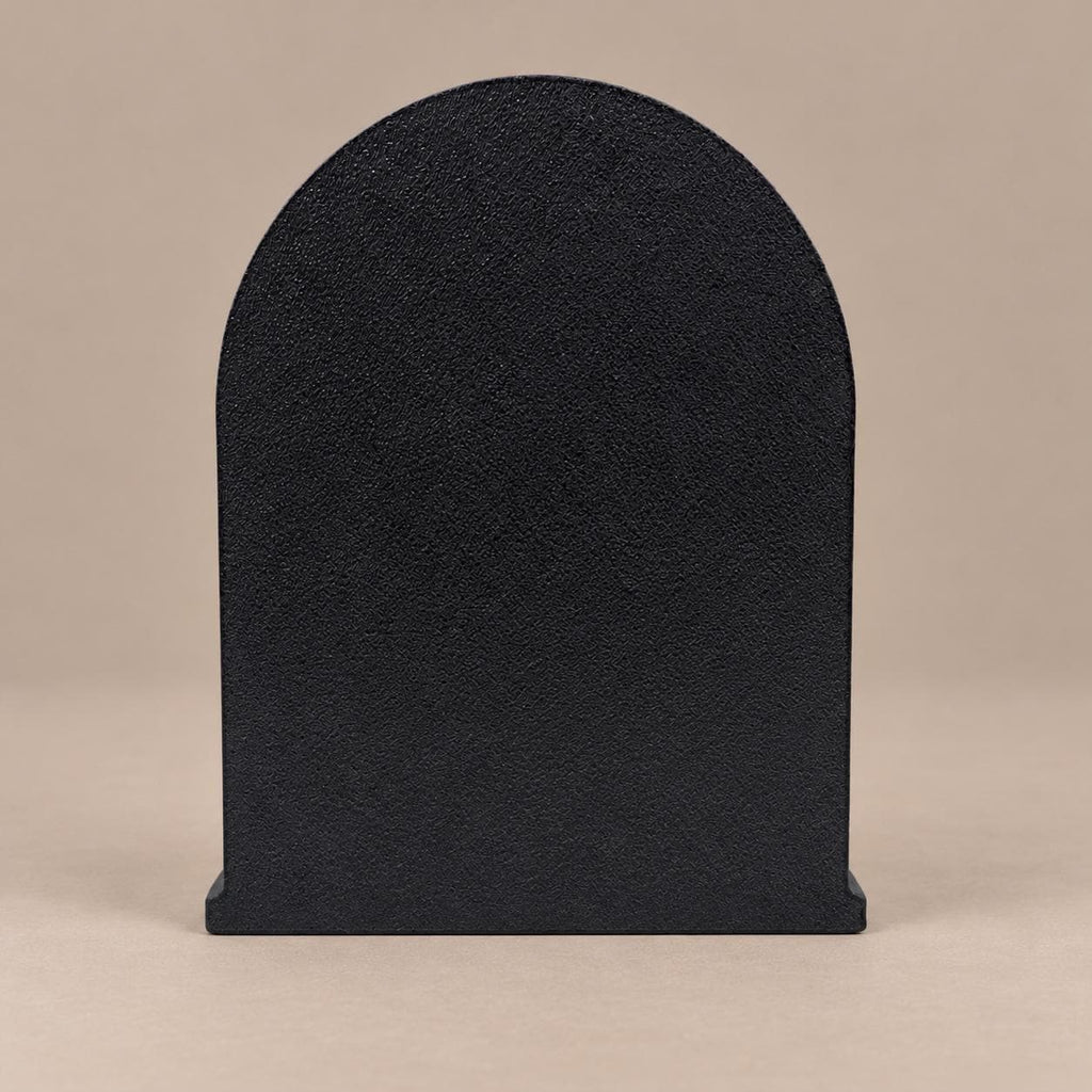 Back of the Lilith statue showing the plain flat arched back