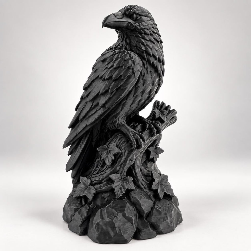 Front angle of the black raven statue showing layered feathers and beak