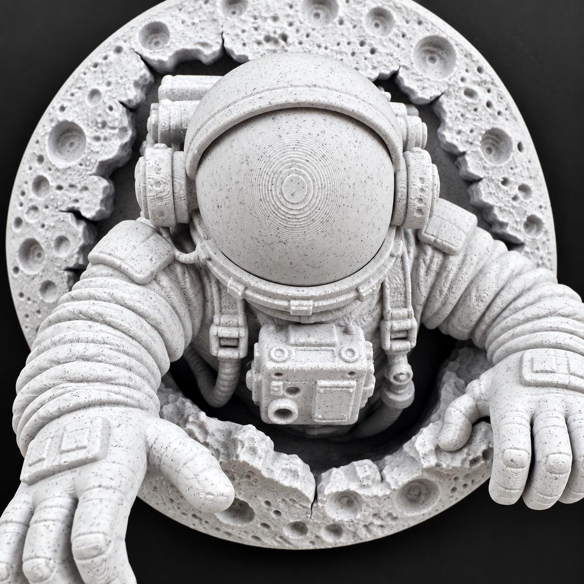 Close-up of the astronaut's helmet, chest controls and gloves