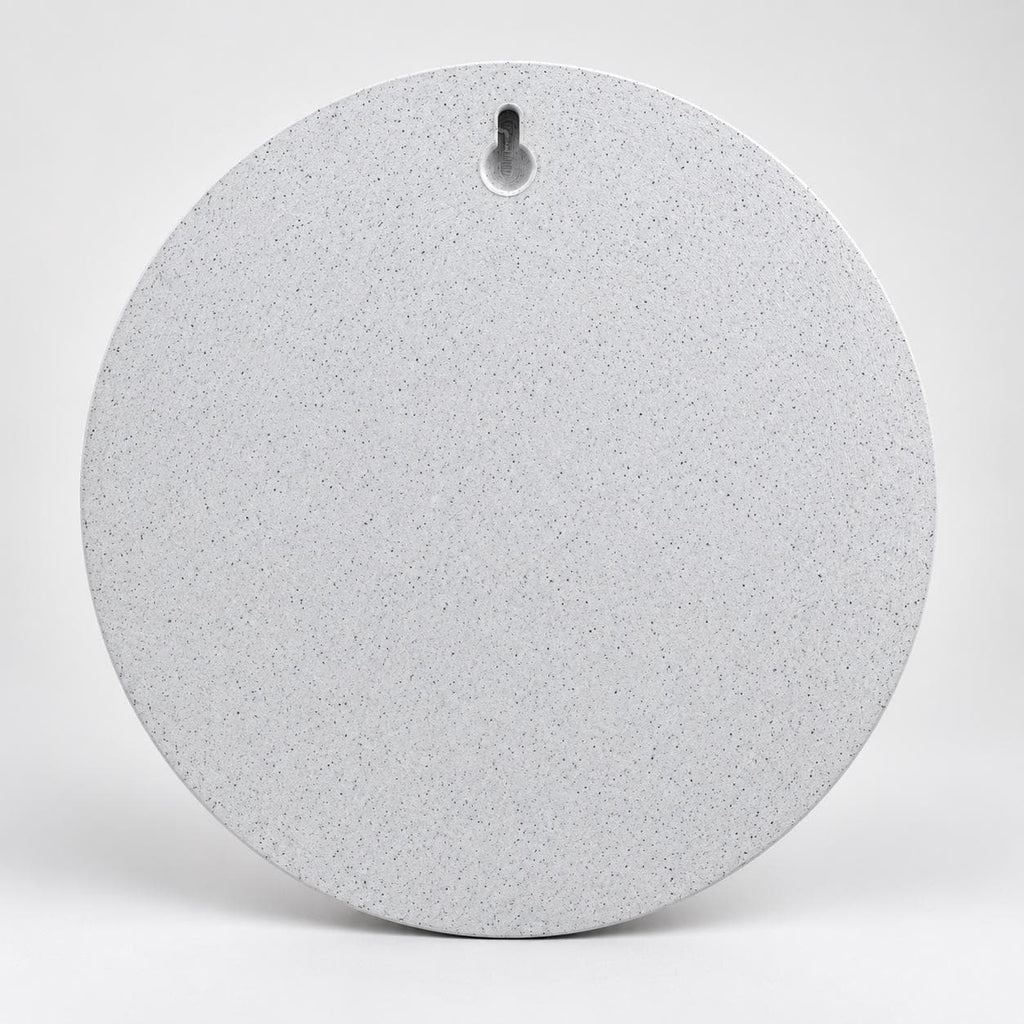 Back of the round moon sculpture showing the keyhole slot