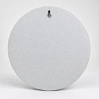 Back of the round moon sculpture showing the keyhole slot