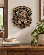Cat memorial plaque hung above a wooden dresser with books and a plant