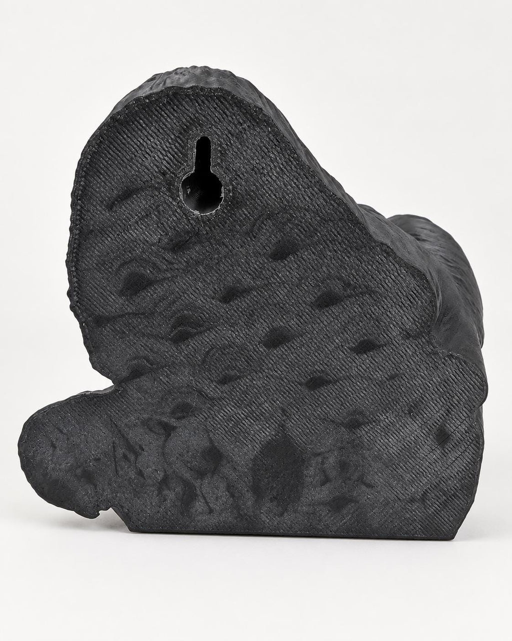 Back of the gorilla sculpture showing the keyhole mount