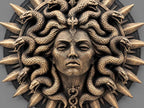 Angled close view of the gold Medusa medallion showing serpent relief