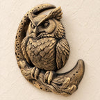 Left angle of the gold owl and moon relief showing depth