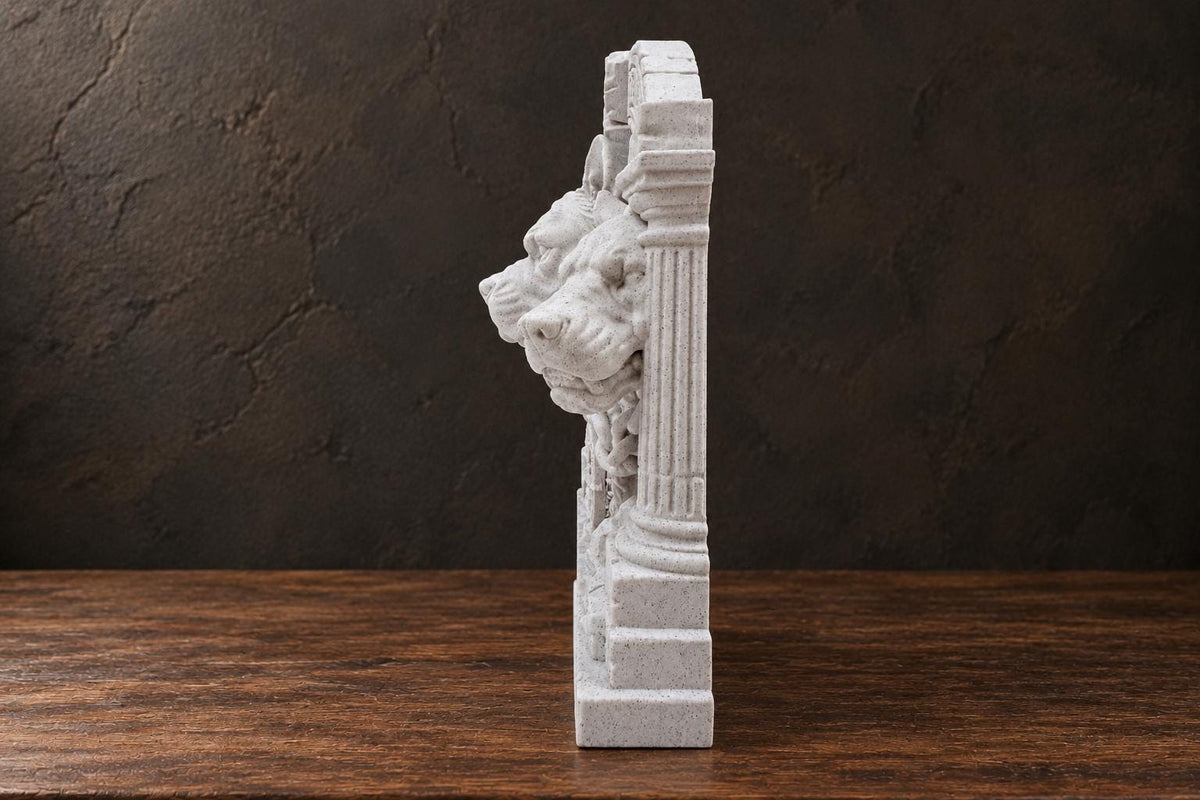 Side profile of the Cerberus sculpture showing its relief depth