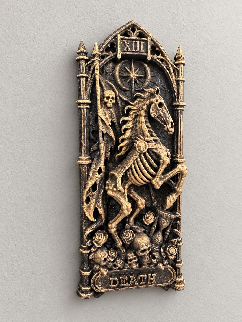 Right angle of the tarot Death relief showing the skeletal rider and banner