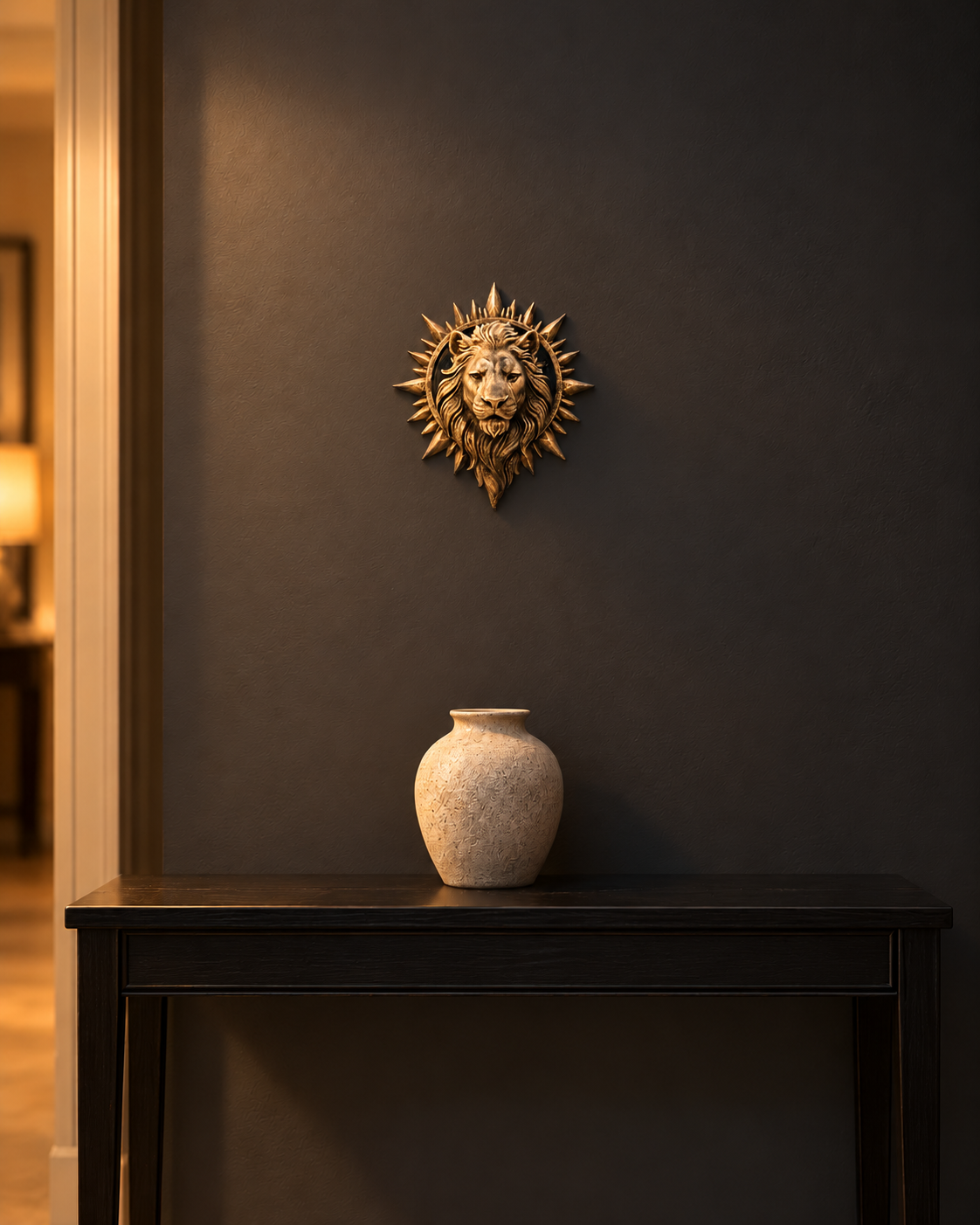 Sunburst lion wall sculpture centered above a black console table in an entryway